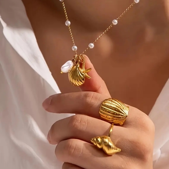 Anthropologie Jewelry - 18 KT Gold Over Titanium Shell Necklace